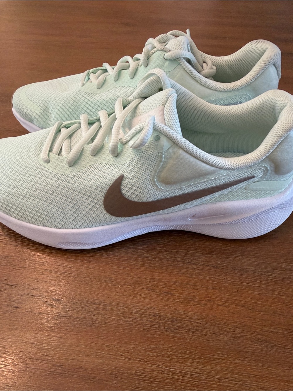 Nike Women's Seafoam Mint Running Sneakers with silver Swoosh